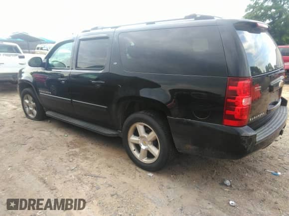 2007 Chevrolet Suburban LTZ z VIN 3GNFC16097G247674, wystawiony jako IAAI lot #42168577 z przebiegiem 217 864 mil mil oraz . Historia ofert i sprzedaży dostępna na DreamBid. Obrazek 3.