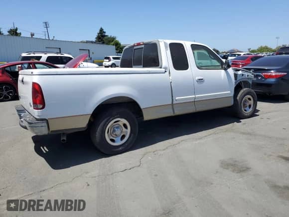 2000 Ford F-150 XL z VIN 1FTRX17W9YKA49152, wystawiony jako Copart lot #60577505 z przebiegiem Nie podano mil oraz Szkoda całkowita • Salvage title. Historia ofert i sprzedaży dostępna na DreamBid. Obrazek 3.