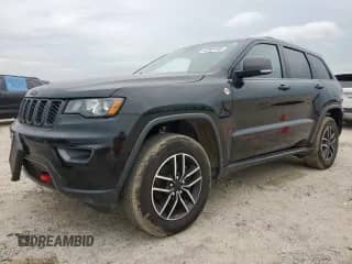 2019 Jeep Grand Cherokee Trailhawk with VIN 1C4RJFLG8KC613582, listed as a Copart auction lot 62901405 with 136,809 mi miles and Salvage title. Bid and sale history available at DreamBid. Image 1.