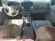 2010 Nissan Frontier LE with VIN 1N6AD0EV5AC418385, listed as a Copart auction lot 70004095 with 88,919 mi miles and Salvage title. Bid and sale history available at DreamBid. Image 8.