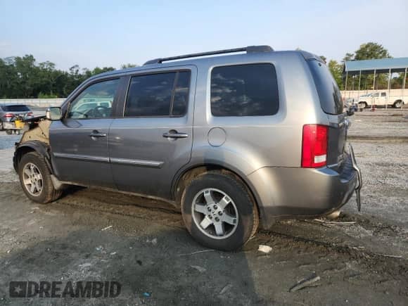 2009 Honda Pilot Touring with VIN 5FNYF38829B016406, listed as a Copart auction lot 71791575 with 221,923 mi miles and Salvage title. Bid and sale history available at DreamBid. Image 2.