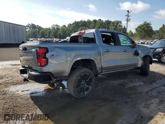 2025 Chevrolet Colorado 4WD Z71 с VIN 1GCPTDEK1S1198818, выставлен на аукционе Copart как лот 65616045 с пробегом 16 миль миль и Списание • Salvage title. История ставок и продаж доступна на DreamBid. Изображение 3.