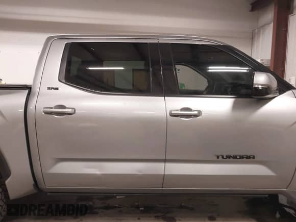 2022 Toyota Tundra SR5 with VIN 5TFLA5DB7NX048368, listed as a IAAI auction lot 41583652 with 26,021 mi miles and . Bid and sale history available at DreamBid. Image 14.