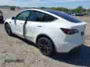 2023 Tesla Model Y Long Range with VIN 7SAYGDEE9PA033911, listed as a IAAI auction lot 43202182 with 35,938 mi miles and . Bid and sale history available at DreamBid. Image 3.