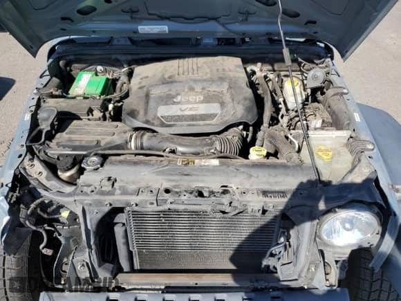 2015 Jeep Wrangler Sport with VIN 1C4AJWAG7FL613059, listed as a Copart auction lot 69094475 with 105,891 mi miles and Salvage title. Bid and sale history available at DreamBid. Image 11.