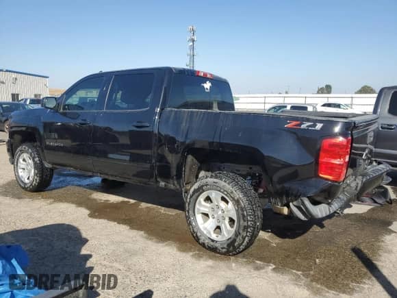 2018 Chevrolet Silverado 1500 LT z VIN 3GCUKREC3JG516403, wystawiony jako Copart lot #82135815 z przebiegiem 138 927 mil mil oraz Szkoda całkowita • Salvage title. Historia ofert i sprzedaży dostępna na DreamBid. Obrazek 2.