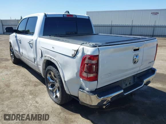 2020 Ram 1500 Longhorn with VIN 1C6SRFKM9LN229373, listed as a IAAI auction lot 42246047 with 134,671 mi miles and . Bid and sale history available at DreamBid. Image 3.