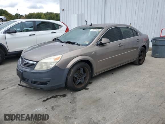 2007 Saturn Aura XE с VIN 1G8ZS57N57F212796, выставлен на аукционе Copart как лот 73717604 с пробегом 162 445 миль миль и Чистый • Clean title. История ставок и продаж доступна на DreamBid. Изображение 1.