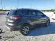 2017 Ford Escape Titanium с VIN 1FMCU0JD0HUB36440, выставлен на аукционе Copart как лот 70005225 с пробегом 130 016 миль миль и Списание • Salvage title. История ставок и продаж доступна на DreamBid. Изображение 3.