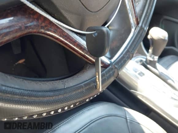 2013 Chevrolet Malibu LTZ z VIN 1G11H5SA7DU134429, wystawiony jako IAAI lot #43379919 z przebiegiem 137 597 mil mil oraz . Historia ofert i sprzedaży dostępna na DreamBid. Obrazek 11.