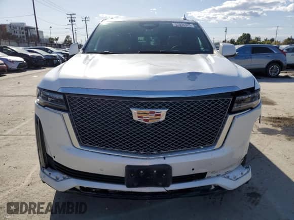 2022 Cadillac Escalade Premium Luxury с VIN 1GYS4BKL6NR153415, выставлен на аукционе Copart как лот 52036525 с пробегом 70 148 миль миль и Списание • Salvage title. История ставок и продаж доступна на DreamBid. Изображение 5.