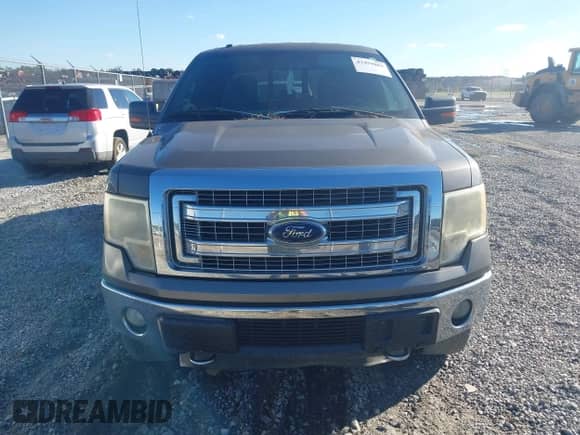 2013 Ford F-150 Lariat with VIN 1FTFW1ET5DKE51436, listed as a IAAI auction lot 43459885 with 149,455 mi miles and . Bid and sale history available at DreamBid. Image 12.