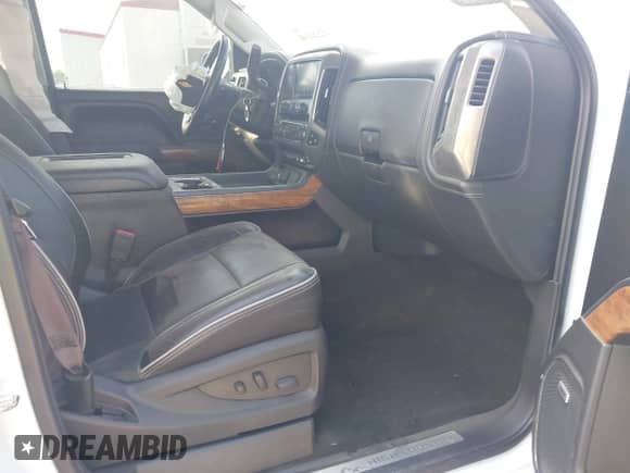 2017 Chevrolet Silverado 1500 High Country с VIN 3GCUKTEJXHG310839, выставлен на аукционе IAAI как лот 43220140 с пробегом 119 535 миль миль и . История ставок и продаж доступна на DreamBid. Изображение 5.