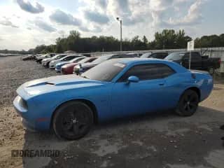 2016 Dodge Challenger R/T с VIN 2C3CDZBT3GH201401, выставлен на аукционе Copart как лот 71590085 с пробегом 70 984 миль миль и Списание • Salvage title. История ставок и продаж доступна на DreamBid. Изображение 1.