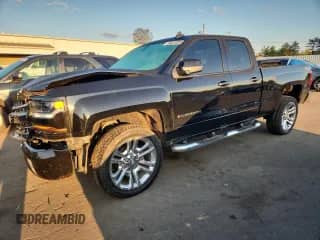 2016 Chevrolet Silverado 1500 LT с VIN 1GCVKREC9GZ400555, выставлен на аукционе Copart как лот 80023885 с пробегом 106 679 миль миль и Списание • Salvage title. История ставок и продаж доступна на DreamBid. Изображение 1.
