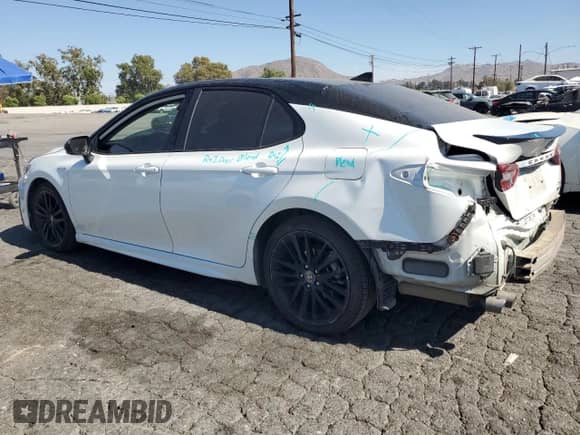 2021 Toyota Camry Hybrid XSE with VIN 4T1K31AK4MU028027, listed as a Copart auction lot 69702145 with 84,116 mi miles and Salvage title. Bid and sale history available at DreamBid. Image 2.