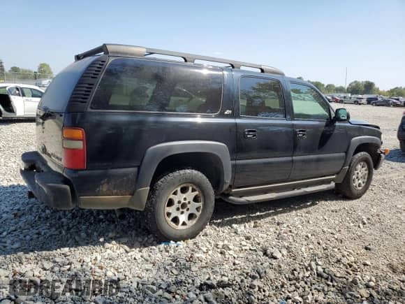 2003 Chevrolet Suburban Z71 z VIN 3GNFK16Z93G264731, wystawiony jako Copart lot #71243894 z przebiegiem Nie podano mil oraz Szkoda całkowita • Salvage title. Historia ofert i sprzedaży dostępna na DreamBid. Obrazek 3.