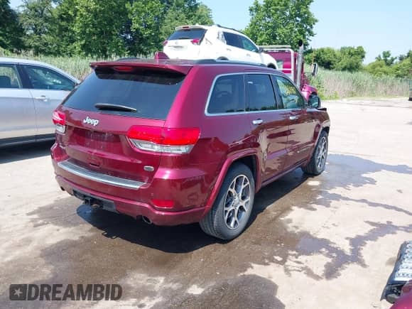 2019 Jeep Grand Cherokee High Altitude with VIN 1C4RJFCG3KC699948, listed as a IAAI auction lot 42681467 with 40,932 mi miles and . Bid and sale history available at DreamBid. Image 4.