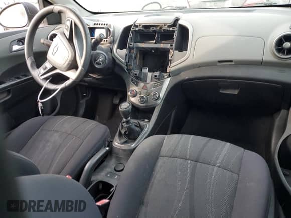 2012 Chevrolet Sonic LT z VIN 1G1JD5SB5C4180537, wystawiony jako Copart lot #86329704 z przebiegiem 134 506 mil mil oraz Szkoda całkowita • Salvage title. Historia ofert i sprzedaży dostępna na DreamBid. Obrazek 8.