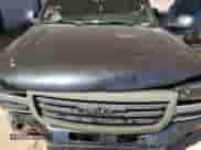 2003 GMC Sierra 1500 SLE z VIN 2GTEC19V831300489, wystawiony jako Copart lot #82320705 z przebiegiem 146 528 mil mil oraz Szkoda całkowita • Salvage title. Historia ofert i sprzedaży dostępna na DreamBid. Obrazek 11.