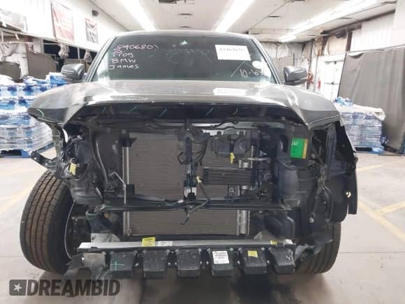 2019 Toyota Tacoma TRD Off Road with VIN 3TMCZ5AN2KM194198, listed as a IAAI auction lot 43463635 with 48,375 mi miles and . Bid and sale history available at DreamBid. Image 13.