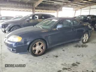 2004 Hyundai Tiburon GS с VIN KMHHM65D04U107131, выставлен на аукционе Copart как лот 72101305 с пробегом 136 073 миль миль и Списание • Salvage title. История ставок и продаж доступна на DreamBid. Изображение 1.