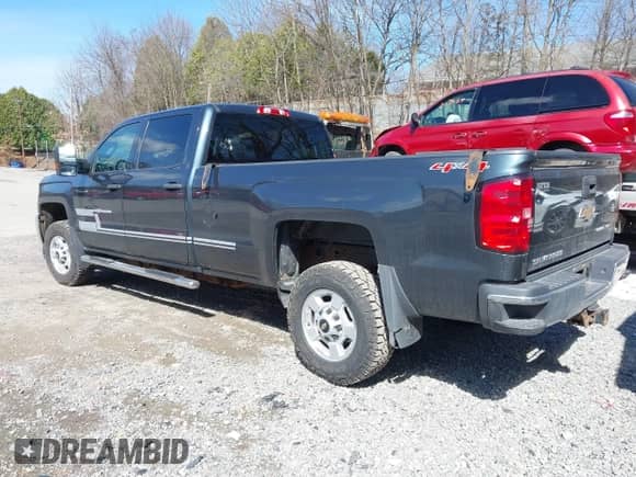 2017 Chevrolet Silverado 2500HD Work Truck z VIN 1GC1KUEG0HF219674, wystawiony jako IAAI lot #41883430 z przebiegiem 94 113 mil mil oraz . Historia ofert i sprzedaży dostępna na DreamBid. Obrazek 3.