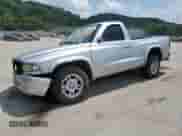 2002 Dodge Dakota z VIN 1B7FL16X12S692630, wystawiony jako Copart lot #66768875 z przebiegiem 135 930 mil mil oraz Szkoda całkowita • Salvage title. Historia ofert i sprzedaży dostępna na DreamBid. Obrazek 1.