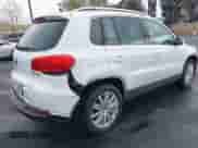 2015 Volkswagen Tiguan S with VIN WVGAV7AX4FW598203, listed as a IAAI auction lot 41902411 with 86,363 mi miles and . Bid and sale history available at DreamBid. Image 4.