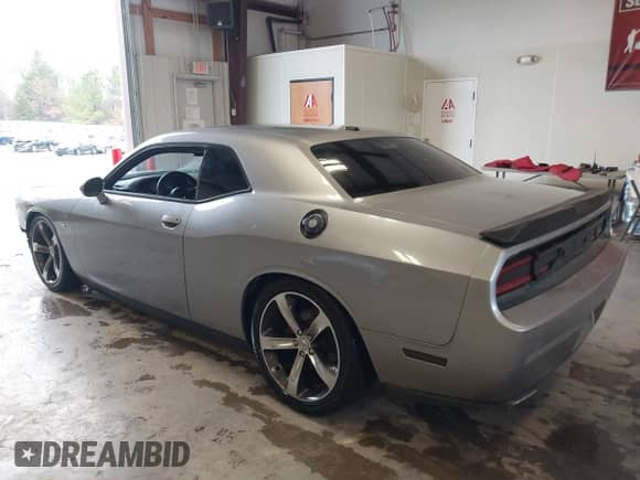 2014 Dodge Challenger R/T с VIN 2C3CDYBT5EH299046, выставлен на аукционе IAAI как лот 41330322 с пробегом 131 738 миль миль и . История ставок и продаж доступна на DreamBid. Изображение 3.