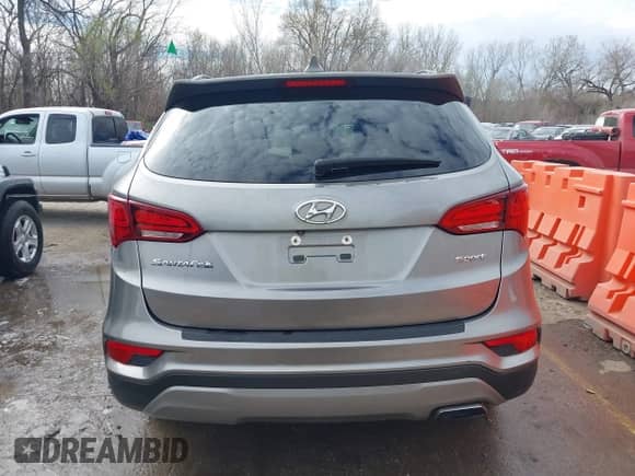 2017 Hyundai Santa Fe 2.4L with VIN 5NMZU3LB2HH035192, listed as a IAAI auction lot 41786734 with 111,425 mi miles and . Bid and sale history available at DreamBid. Image 16.