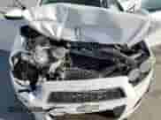 2014 Chevrolet Sonic LT z VIN 1G1JC6SGXE4103170, wystawiony jako Copart lot #67769315 z przebiegiem Nie podano mil oraz Szkoda całkowita • Salvage title. Historia ofert i sprzedaży dostępna na DreamBid. Obrazek 11.