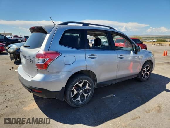 2014 Subaru Forester XT Touring z VIN JF2SJGPCXEH536396, wystawiony jako Copart lot #80501175 z przebiegiem 141 931 mil mil oraz Szkoda całkowita • Salvage title. Historia ofert i sprzedaży dostępna na DreamBid. Obrazek 3.