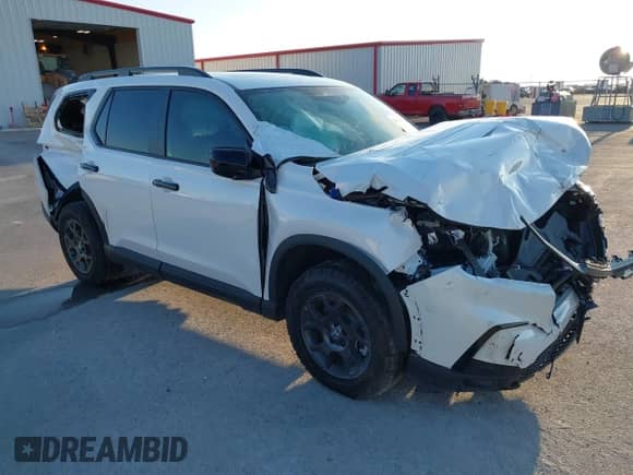 2025 Honda Pilot TrailSport с VIN 5FNYG1H61SB041092, выставлен на аукционе IAAI как лот 40833597 с пробегом 2 393 миль миль и . История ставок и продаж доступна на DreamBid. Изображение 1.