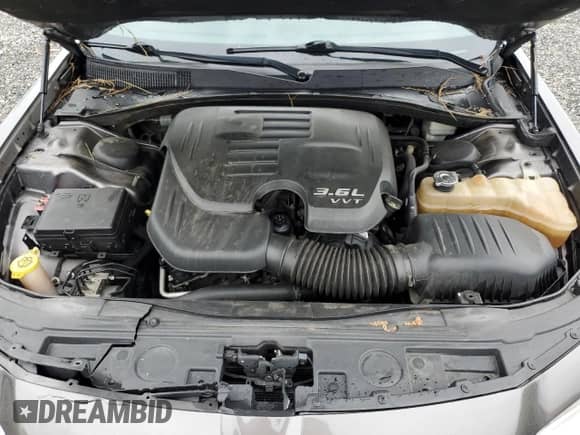 2015 Chrysler 300 C с VIN 2C3CCAEG1FH749396, выставлен на аукционе Copart как лот 67827215 с пробегом 201 331 миль миль и Списание • Salvage title. История ставок и продаж доступна на DreamBid. Изображение 11.