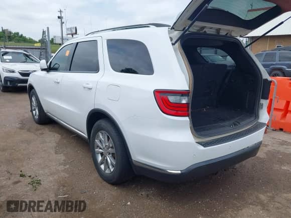 2018 Dodge Durango SXT with VIN 1C4RDHAGXJC290348, listed as a IAAI auction lot 42535304 with 99,981 mi miles and . Bid and sale history available at DreamBid. Image 3.