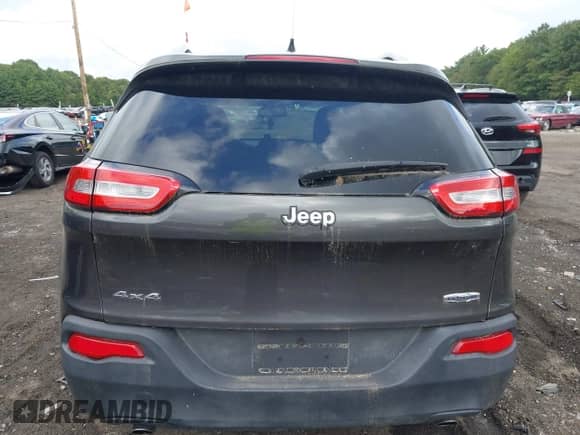 2014 Jeep Cherokee Latitude with VIN 1C4PJMCS5EW200506, listed as a IAAI auction lot 43158630 with 148,814 mi miles and . Bid and sale history available at DreamBid. Image 15.