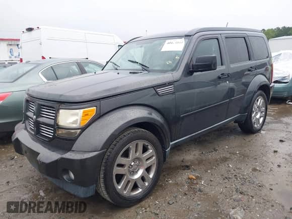2010 Dodge Nitro Heat with VIN 1D4PT4GK3AW173744, listed as a IAAI auction lot 40414840 with 124,221 mi miles and . Bid and sale history available at DreamBid. Image 2.