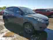 2014 Hyundai Tucson GLS with VIN KM8JT3AF4EU948283, listed as a Copart auction lot 82346985 with 85,631 mi miles and Salvage title. Bid and sale history available at DreamBid. Image 4.