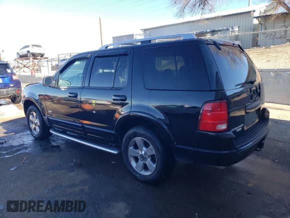 2003 Ford Explorer Limited with VIN 1FMDU75K13ZB31975, listed as a Copart auction lot 83894734 with 311,881 mi miles and Salvage title. Bid and sale history available at DreamBid. Image 2.