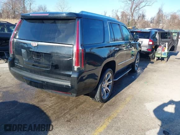 2016 Cadillac Escalade Premium Collection with VIN 1GYS4CKJXGR266873, listed as a IAAI auction lot 41647399 with 153,553 mi miles and . Bid and sale history available at DreamBid. Image 4.