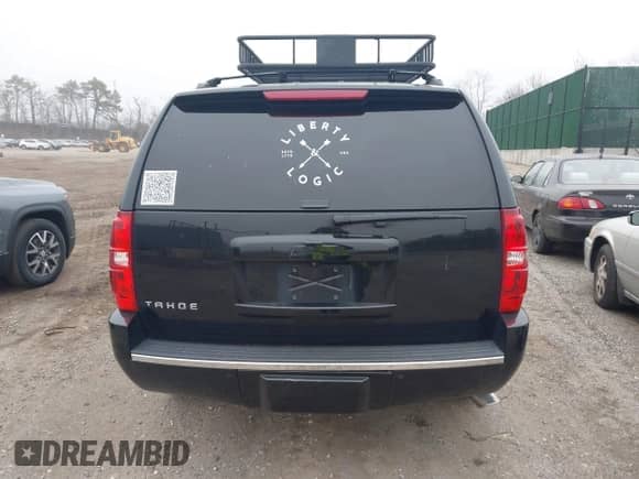 2014 Chevrolet Tahoe LTZ with VIN 1GNSKCE07ER142112, listed as a IAAI auction lot 41870089 with 168,575 mi miles and . Bid and sale history available at DreamBid. Image 16.