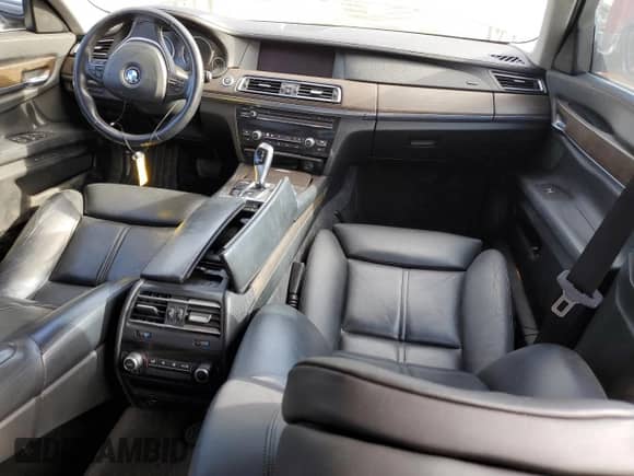 2012 BMW 7 Series with VIN WBAKX8C59CC198457, listed as a Copart auction lot 82165445 with 70,216 mi miles and Salvage title. Bid and sale history available at DreamBid. Image 8.