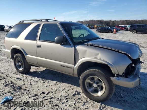 2003 Chevrolet Blazer Xtreme with VIN 1GNCS18X63K132338, listed as a Copart auction lot 84887164 with 211,194 mi miles and Salvage title. Bid and sale history available at DreamBid. Image 4.