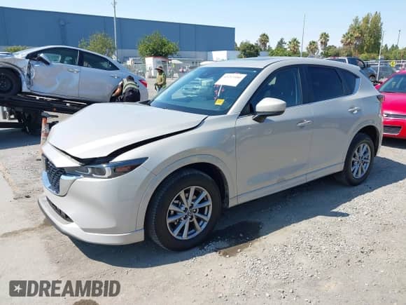 2024 Mazda CX-5 S Preferred z VIN JM3KFBCL8R0407528, wystawiony jako IAAI lot #43213480 z przebiegiem 19 277 mil mil oraz . Historia ofert i sprzedaży dostępna na DreamBid. Obrazek 17.