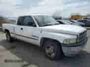 1999 Dodge 1500 with VIN 3B7HC13Z4XG127818, listed as a Copart auction lot 52090945 with 245,977 mi miles and Clean title. Bid and sale history available at DreamBid. Image 4.