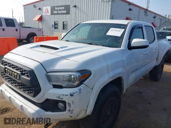 2017 Toyota Tacoma SR5 with VIN 5TFAZ5CNXHX026607, listed as a IAAI auction lot 42356462 with 213,010 mi miles and . Bid and sale history available at DreamBid. Image 18.
