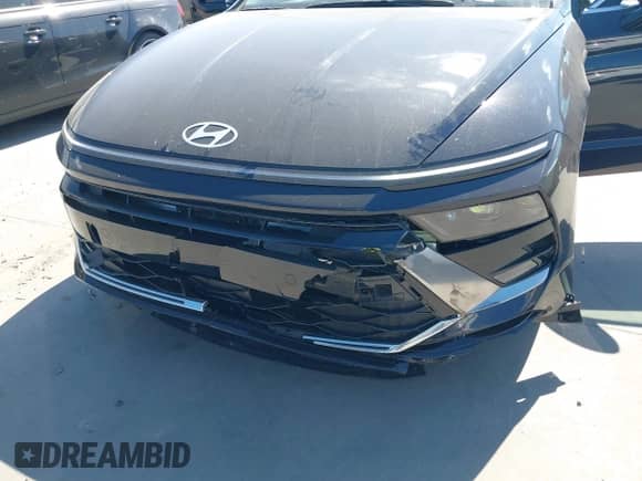 2025 Hyundai Sonata SEL with VIN KMHL64JAXSA439998, listed as a IAAI auction lot 43432349 with 22,906 mi miles and . Bid and sale history available at DreamBid. Image 6.