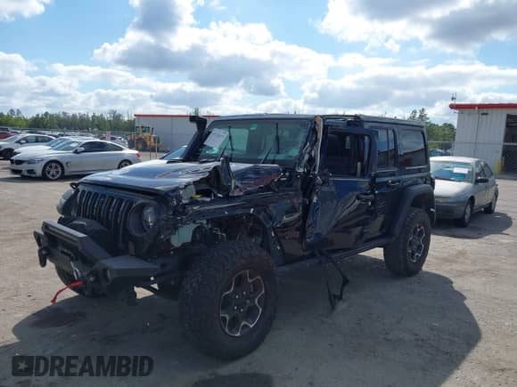 2023 Jeep Wrangler Rubicon с VIN 1C4HJXFGXPW534515, выставлен на аукционе IAAI как лот 41524419 с пробегом 21 376 миль миль и . История ставок и продаж доступна на DreamBid. Изображение 6.