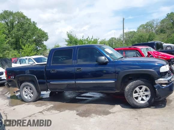 2006 GMC Sierra 1500 SLT with VIN 2GTEK13T461101387, listed as a IAAI auction lot 42113867 with 240,610 mi miles and . Bid and sale history available at DreamBid. Image 13.